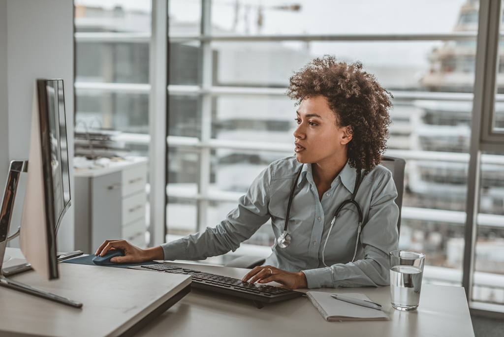 clinical trial site doctor reviewing eCOA technology checklist