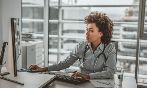 clinical trial site doctor reviewing eCOA technology checklist